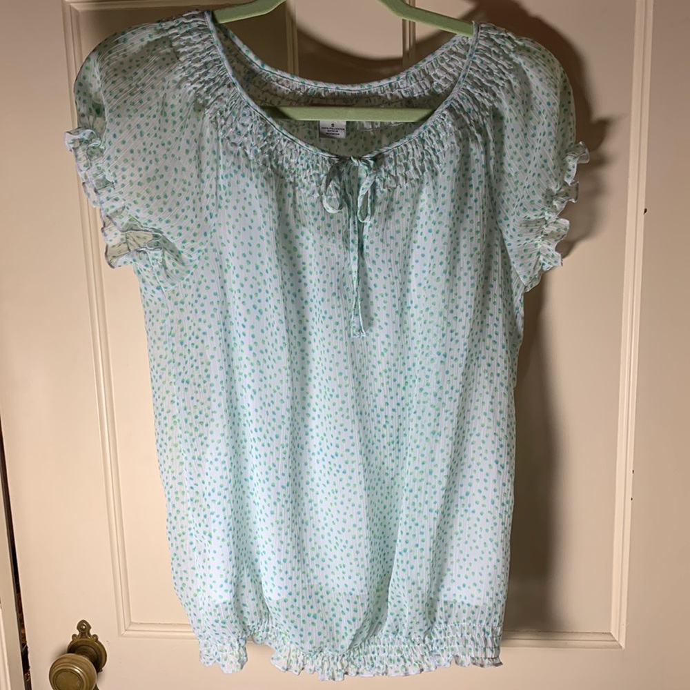 Blue, green, and white speckled blouse